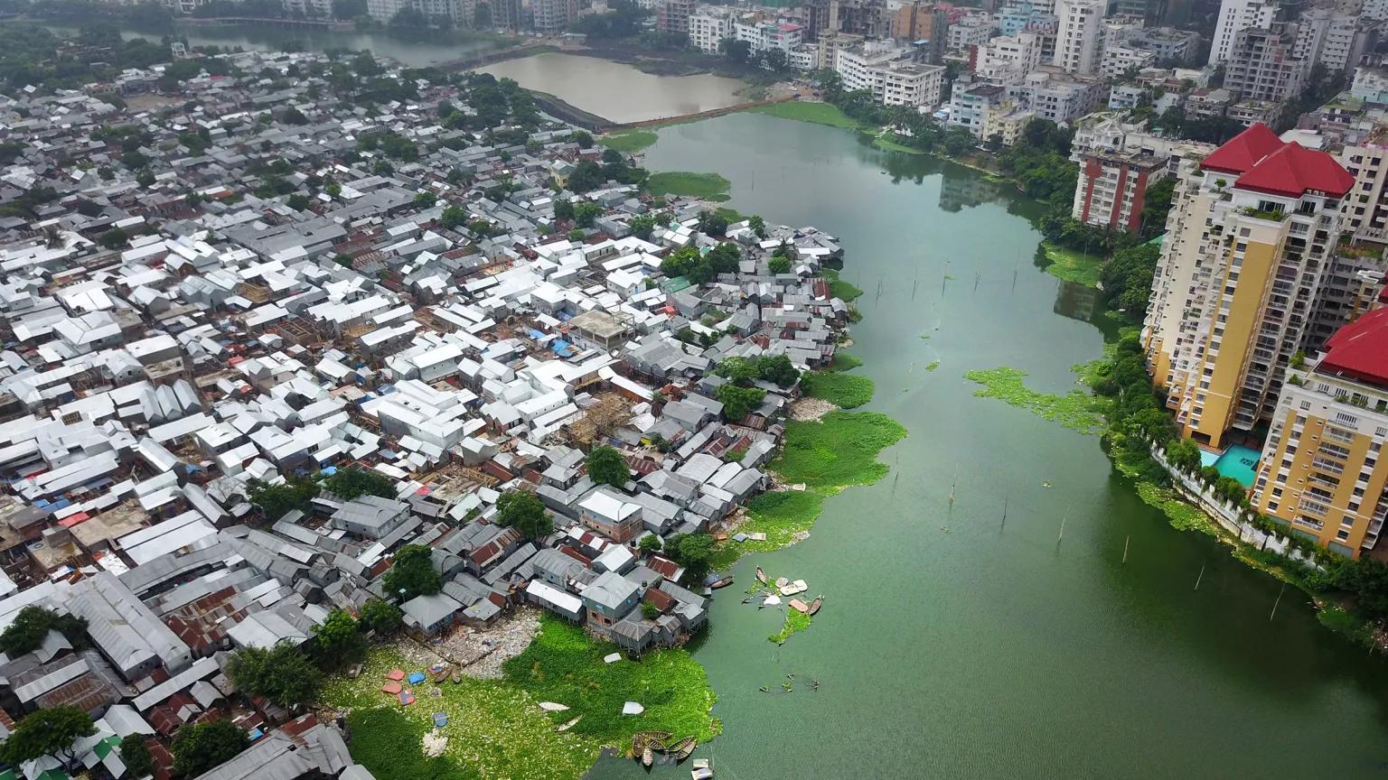 An aerial view of a city with a river running through the center