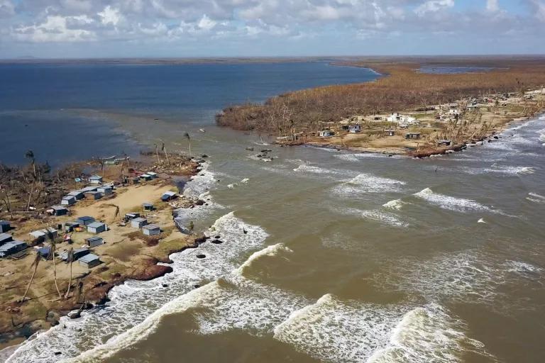 An aeiral vew of a barrier island where water has breached and flooded the land